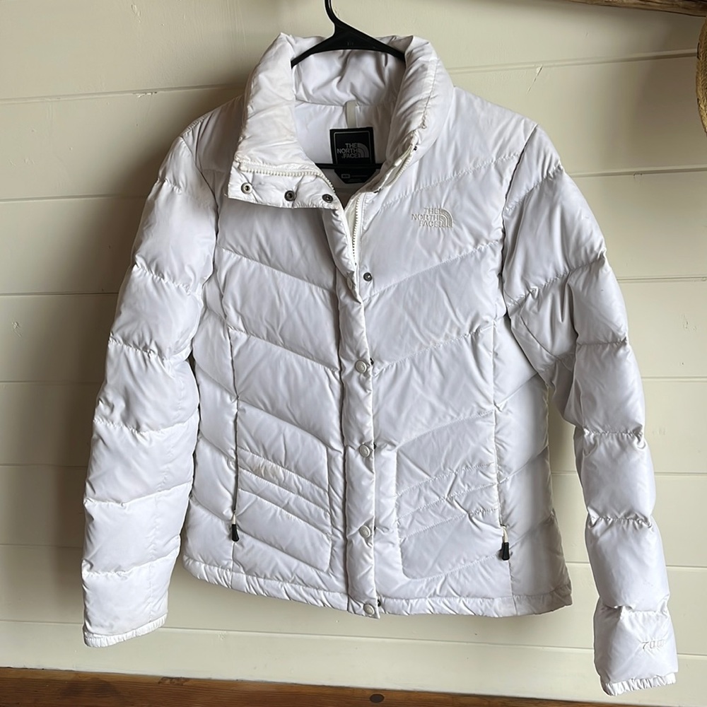 The North Face two piece ski jacket - puffer and windbreaker. Like new.